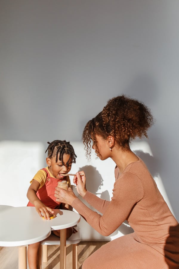 Mother Feeding Baby